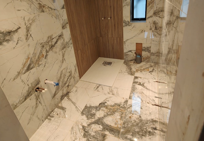 Trusted maintenance and construction bathroom tiling example